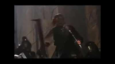 Aragorn helping Uruk-Hai on set after hitting him. A true gentleman 
