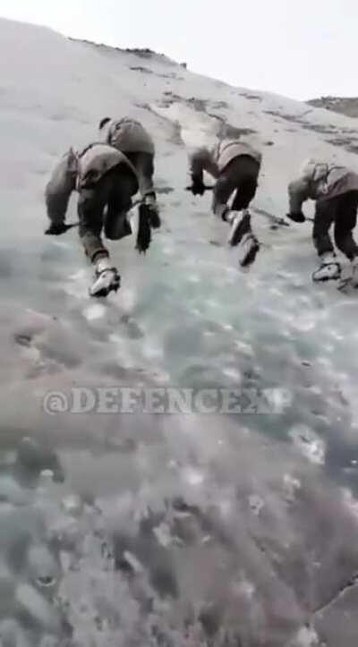 Soldiers Climbing Stepp Mountains On Kargil.