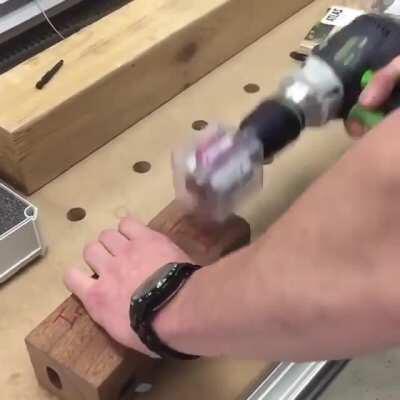 Tightening hidden fasteners in wood with a spinning magnet (Lamello Invis Mx2)