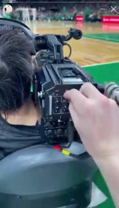 Jack Harlow toying around with camerawoman's camera during Bucks vs Celtic game.