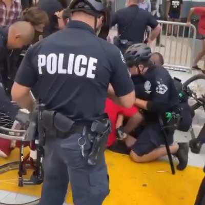 Cops assaulting BLM protesters, including a man in a wheelchair. This happened yesterday in Downtown Los Angeles. One of the people injured in by police even had a seizure. Meanwhile, complicit media reported the arrested individuals (including the wheelc