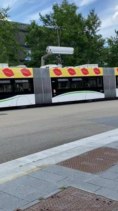 Electric city bus fast charging at station. Nantes, France