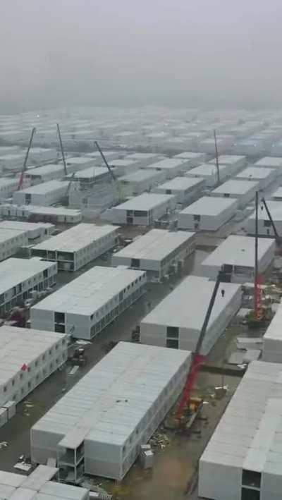 The largest quarantine camp in China's Guangzhou city is being built. It has 90,000 isolation pods.