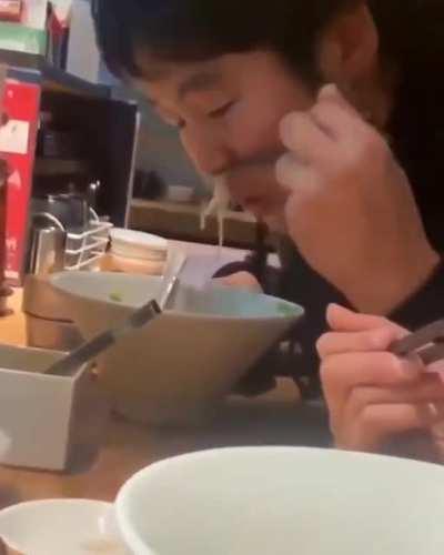 Eating ramen through nose