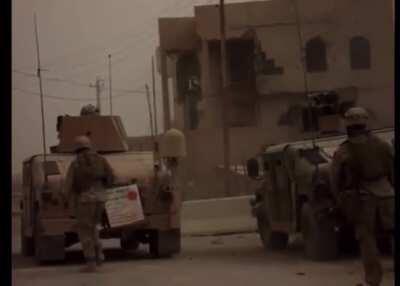 Marines advancing through Ramadi, 2006