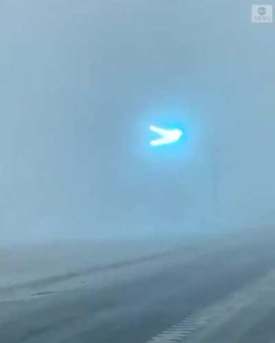 Cellphone footage shows power lines flashing as blizzard sweeps through Minnesota