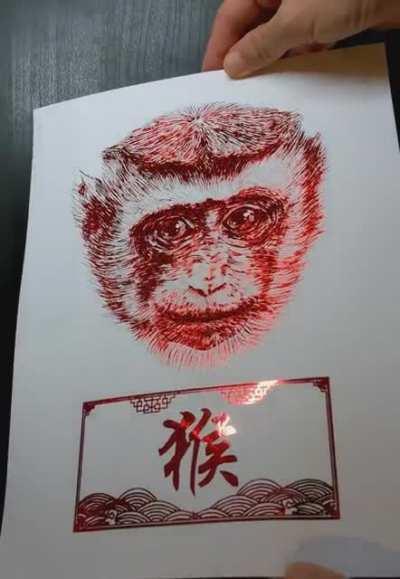 The Monkey from the Chinese Zodiac in red foil