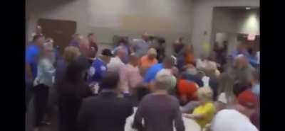 A fight breaks out at a Arkansas GOP meeting.