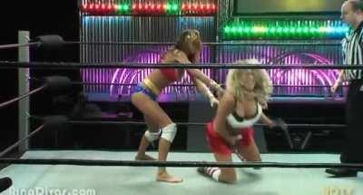 Lacey Von Erich takes a stiff uppercut from Destiny Dumon