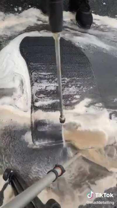 Cleaning a car mat!