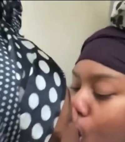 Black couple kissing 