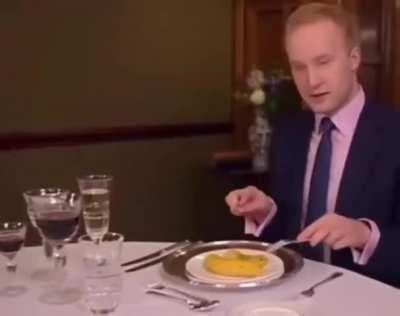 Etiquette expert demonstrates how the Queen would eat a banana