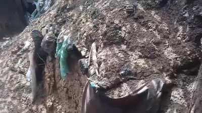 Russian bodies in the walls of a trench. Ukraine 2024 