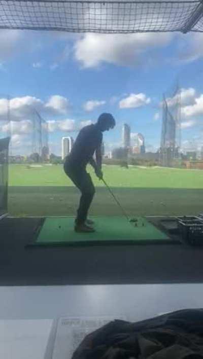 Look at my friend's golf swing