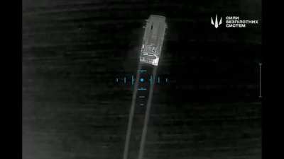 Russian Buk-M2 air defense system being attacked at night by a drone. 