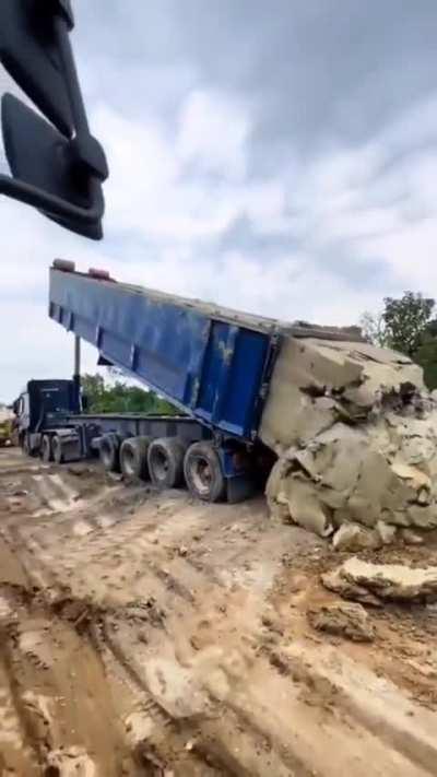 Dump trailer full of clay