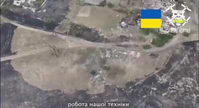 Ukrainian BTR attacking Russian positions past the rail bridge in Mykhailivka, Donetsk Oblast. September 2024