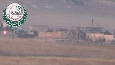 FSA 19th Division ATGM team targets a Syrian Army Tank near 