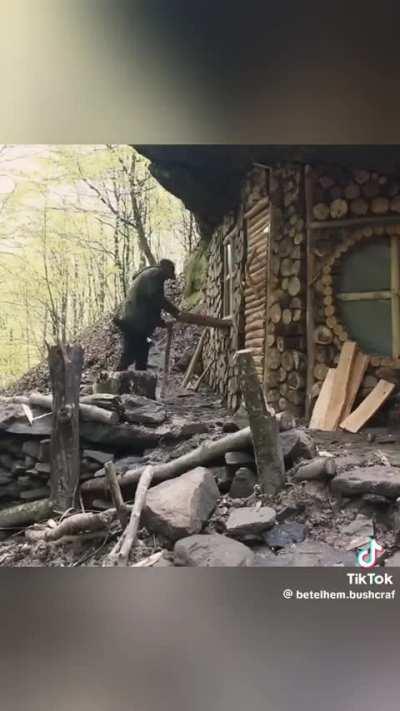 Building a house under a rock ledge 