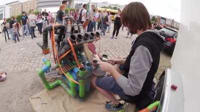 Talented street pipe drummer