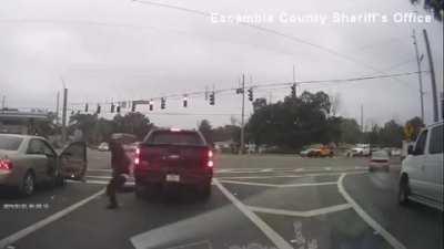 Idiots having a quick gunfight at a traffic light