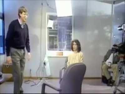 A software developer jumping over chair, 1994