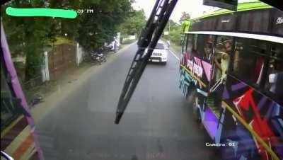 Tamil Nadu bus is Overtaking a bus which is overtaking a bus