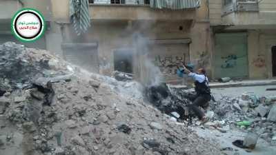 FSA fighters suffer a bit of a setback while suppressing SAA positions with rifle fire - Salah al-Din, Aleppo - 7/8/2013