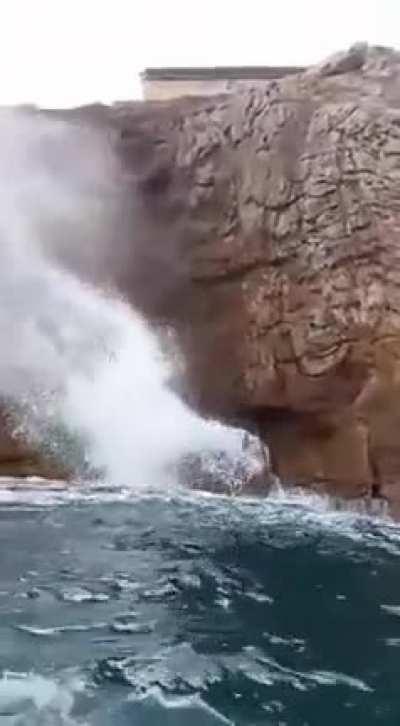 'Nivati Rocks' or Marine Geysers/blowhole(an erosional phenomenon) off the coast of Sindhudurg in Maharashtra, India where the sea waves travel upwards through a sea cave and are expelled out of the opening.