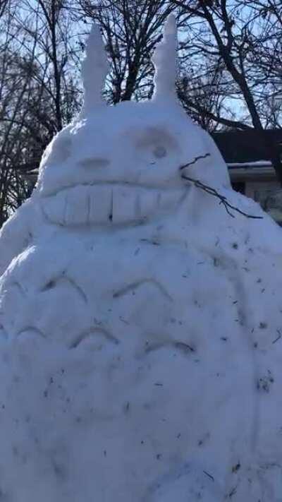 (OC) It may have taken the whole weekend to collect and haul snow from the entire yard, but we did it! I present to you all: snow-Totoro or “Snotoro” Happy New Year, everyone!