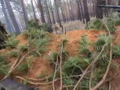 footage showing Ukrainian soldiers defending their position from a russian attack.