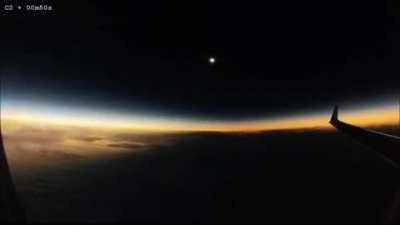 A Solar Eclipse happening Mid-flight