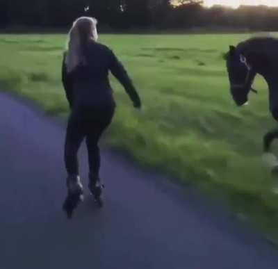 Girl and her horse on an evening stroll together