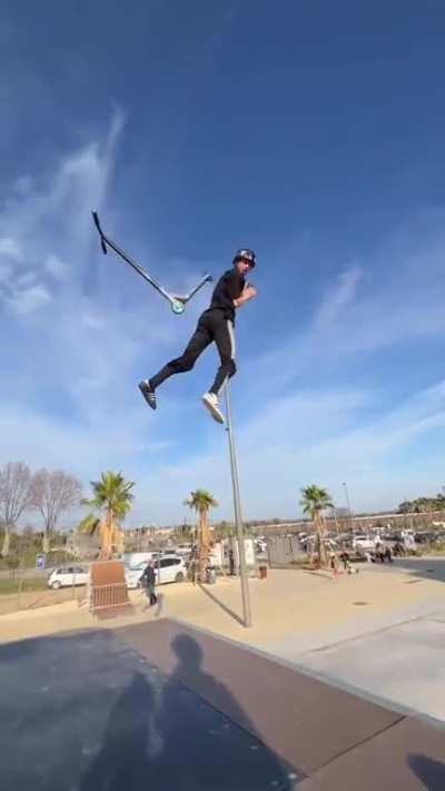 Professional scooter rider Camille Bonnet with this insane scooter flip.