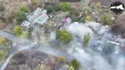 A Ukrainian tank shells a Russian position in the village of Illinka, Donetsk Oblast