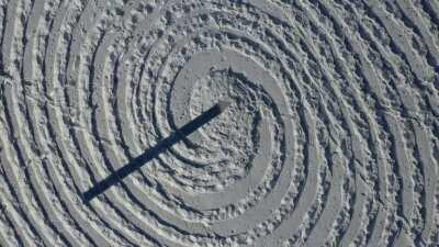 Monolith and snow crop circle. What the aliens saw as they left?