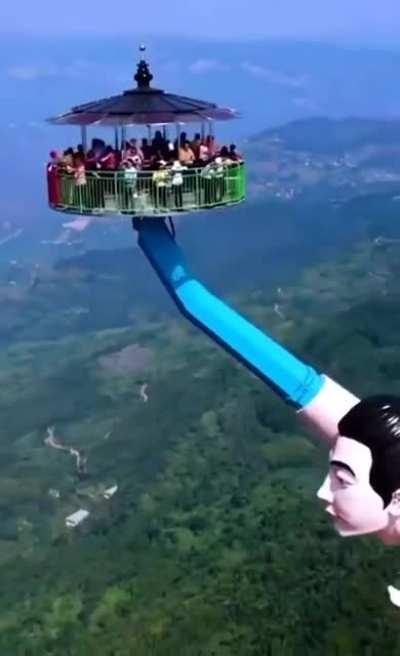 A tourist attraction in China called &quot;Blowing Flying Kisses.&quot; (no seat belts or safety harnesses)