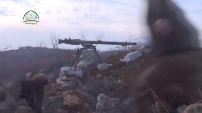 Opposition recoilless rifle team sets up & engages a sandbagged SAA fighting position - Bureij, Aleppo - 1/5/2015