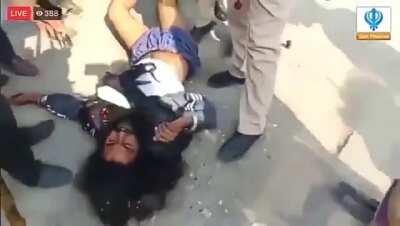 A Sikh protester getting beaten mercilessly by police and supposed &quot;locals&quot;.