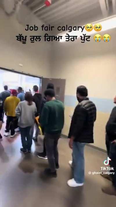 Line up for a job fair in Calgary