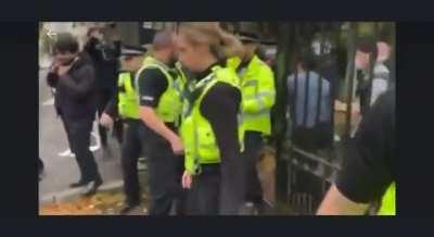 Another angle of protestor being beaten up by members of Chinese consulate in Manchester