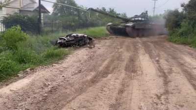 Ukrainian tank of the 54th Mechanized Brigade drove over a destroyed car on the way to the staging area. Siversk region - October 2024.