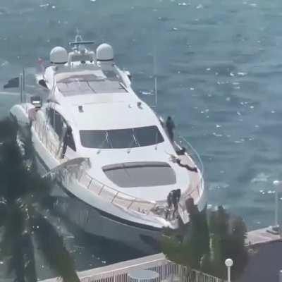 An expensive yacht steers into a wall