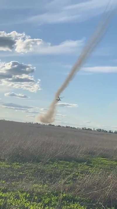 A pair of Mil Mi-24s at low altitude firing their rockets indirectly at Russian targets, then activating countermeasures and maneuvering. May 2024