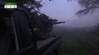 FSA 2nd Coastal Division using a ZU-23-2 technical to arc fire on to distant SAA positions on Abu Ali Hilltop, Latakia - 2016