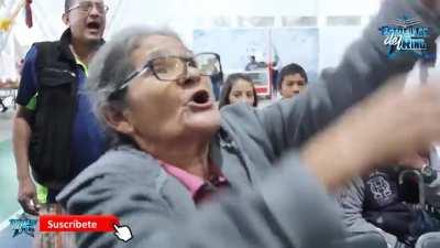 One of the most hilarious pro wrestling interactions between fans and wrestlers: abuelita (grandma) gets mad with the rudo in a lucha show.