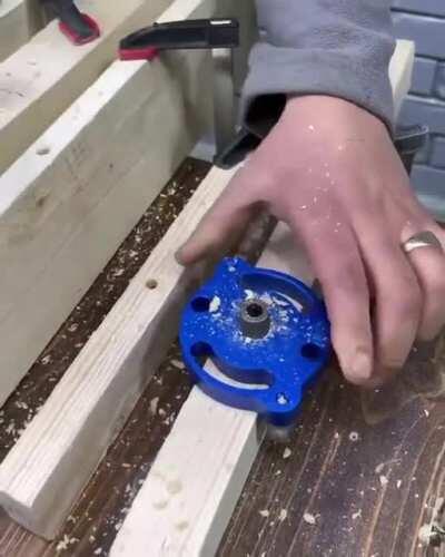 Self-centering dowel jig