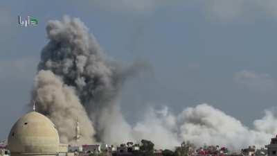 A pair of barrel bombs dropped from SyAAF helicopters on Daraya - 1/29/2014