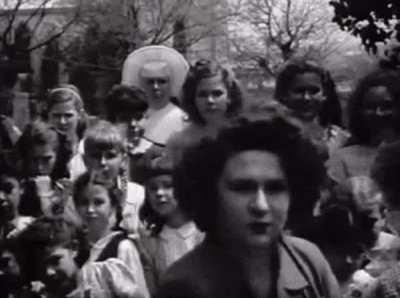 Texas mom throws knives at her daughters in their suburban backyard (1950s newsreel)