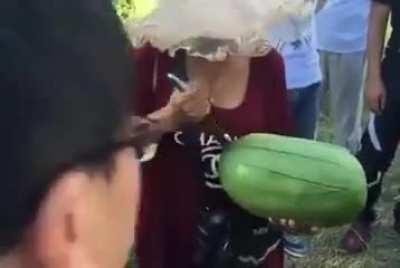 The Mongolian way of cutting a watermelon